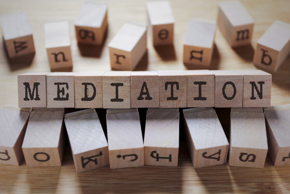 block letters spelling 'mediation'