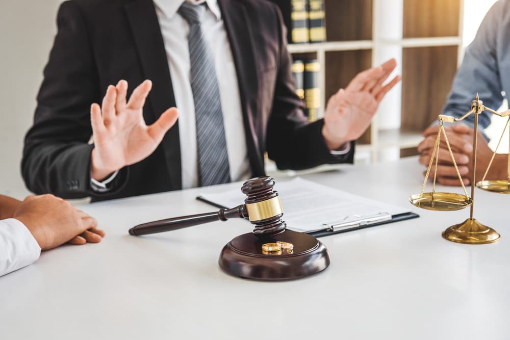 Mediation between marriage, husband and wife during divorce process with male lawyer counselor