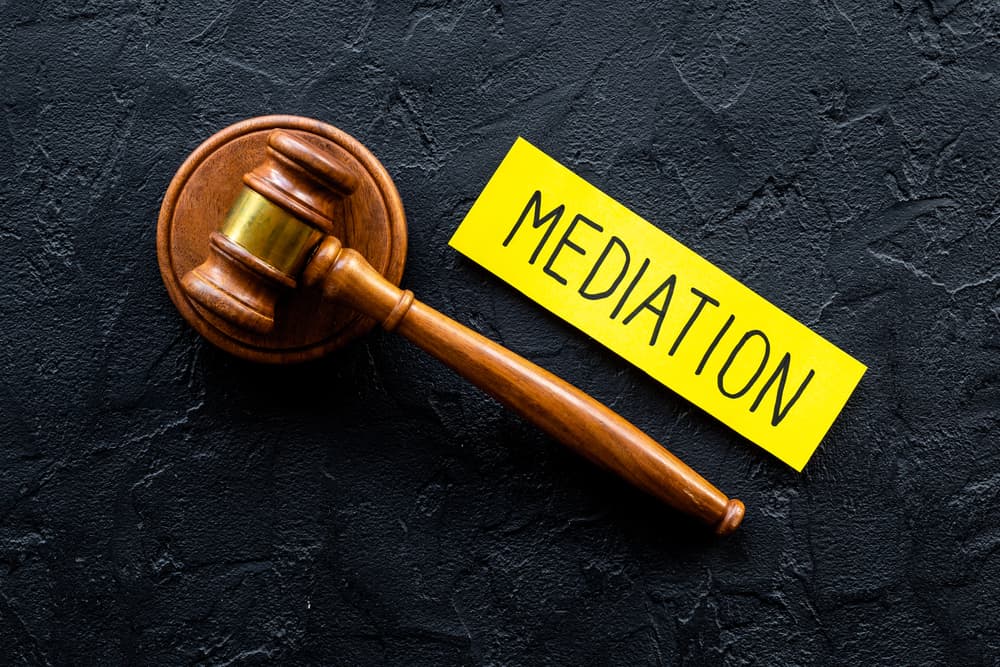 Word mediation with judge gavel. Conflict and dispute resolve concept